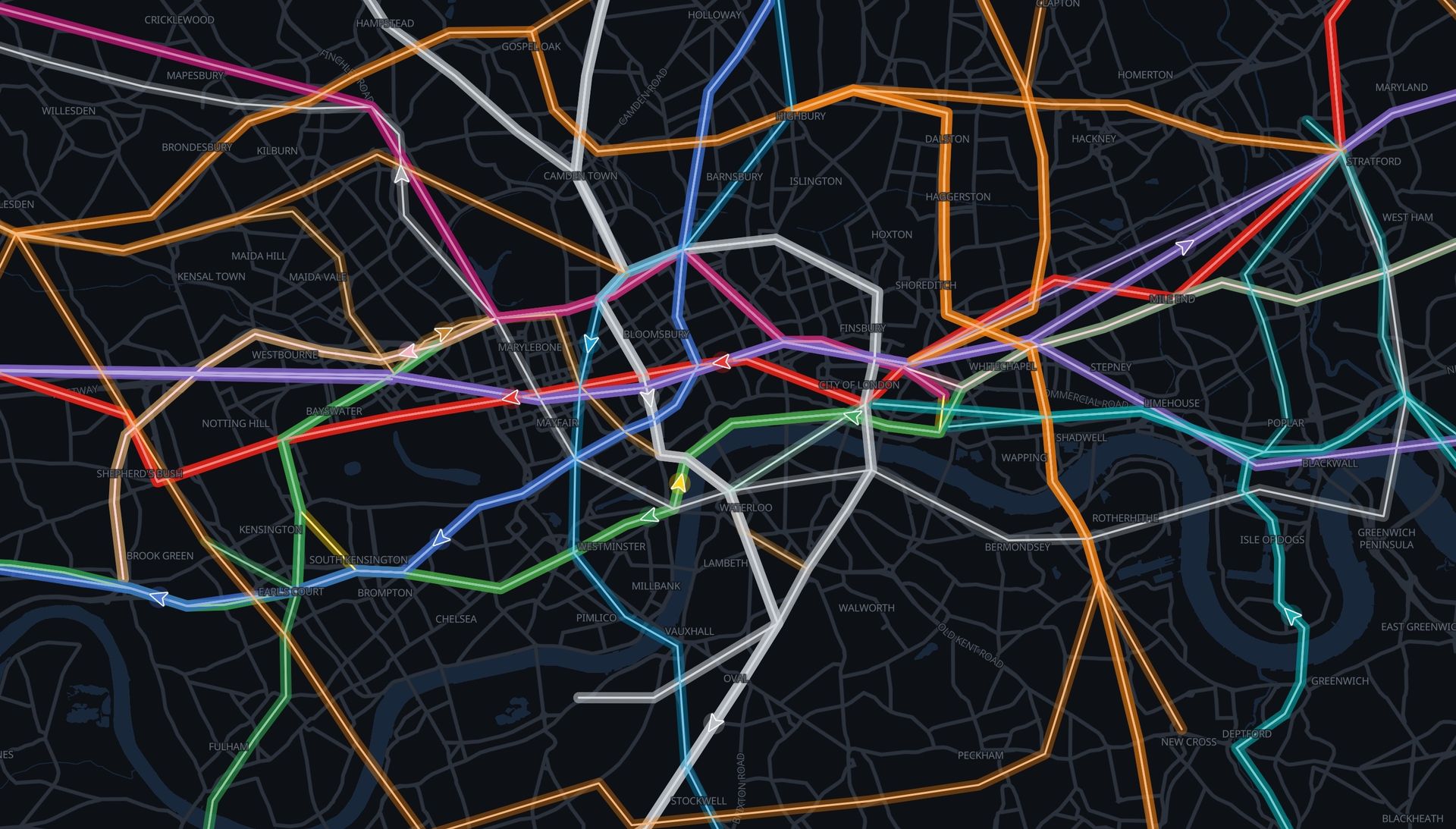 Live map of London at night with every Underground, Overground and Elizabeth line train moving along glowing coloured lines
